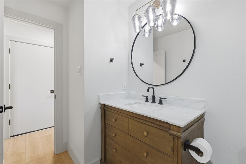 3611 High Drive Grapevine, TX 76051 - Photo 30 of 40 a bathroom with a sink and a mirror