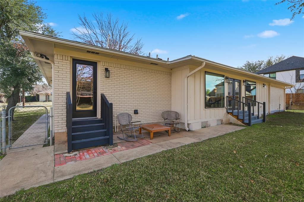 3611 High Drive Grapevine, TX 76051 - Photo 33 of 40 a view of a house with backyard sitting area and garden