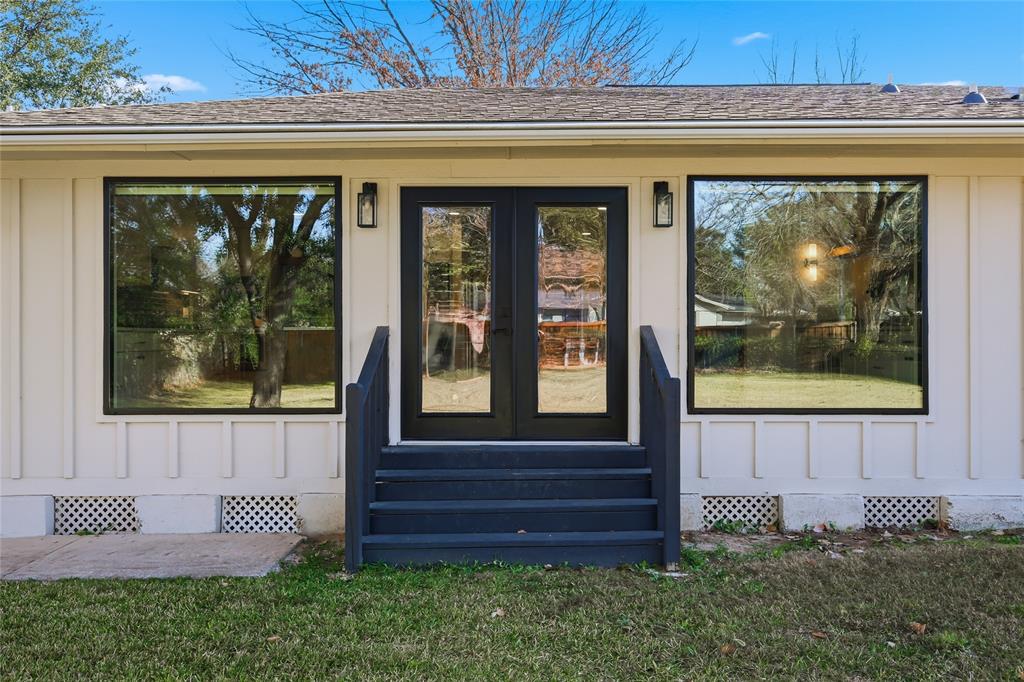 3611 High Drive Grapevine, TX 76051 - Photo 34 of 40 a front view of a house with a yard