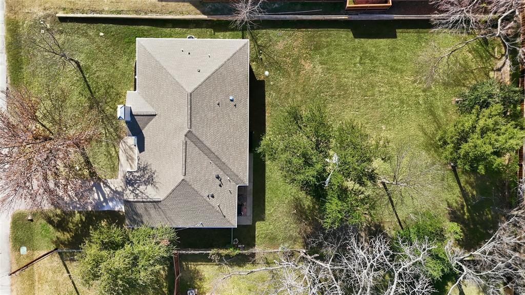3611 High Drive Grapevine, TX 76051 - Photo 38 of 40 an aerial view of a house with a yard swimming pool and large trees