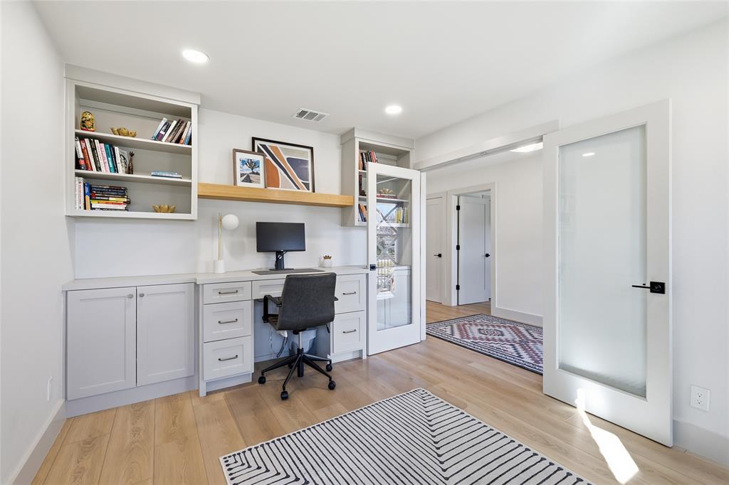 3611 High Drive Grapevine, TX 76051 - Photo 6 of 40 a view of a workspace with furniture and wooden floor