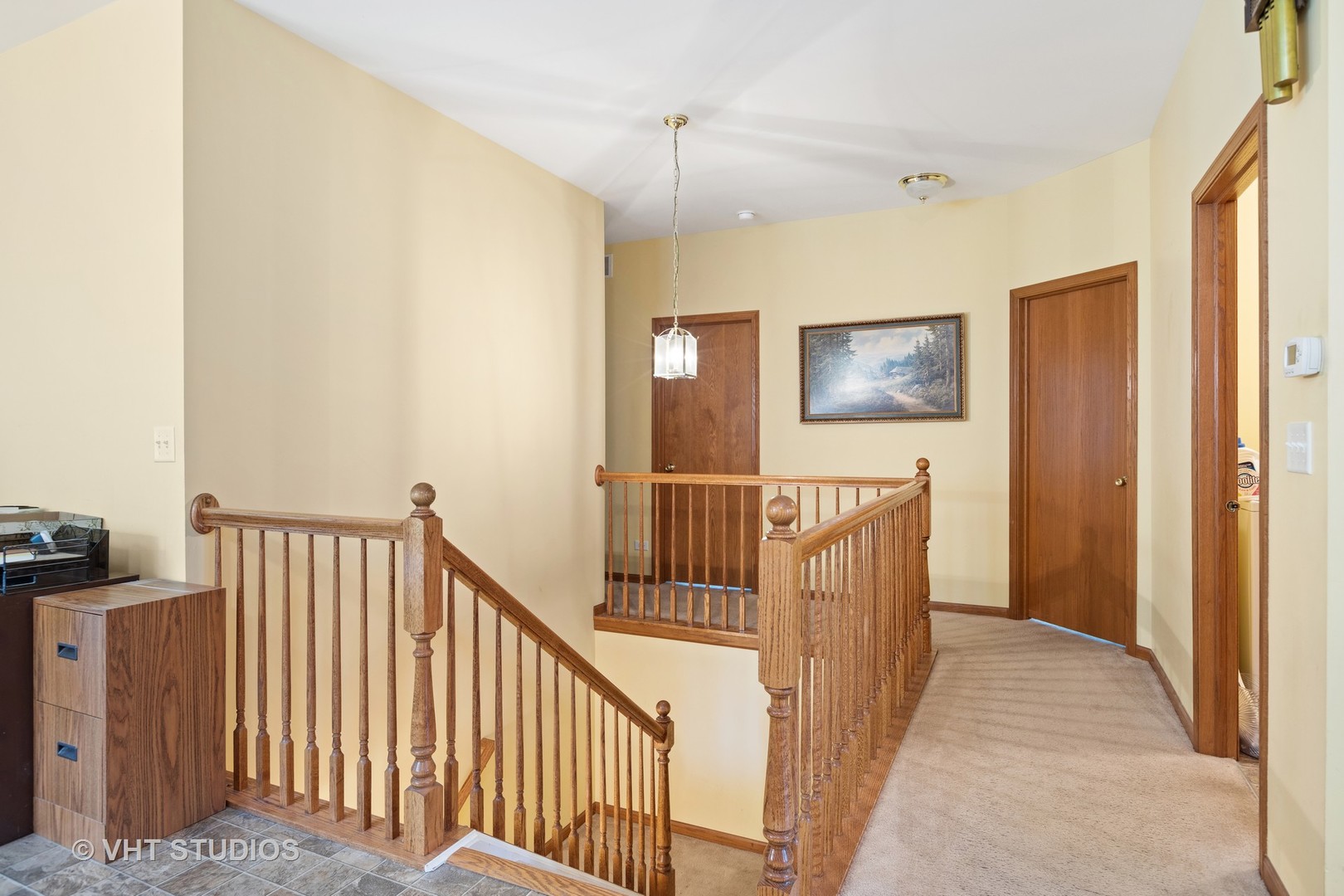 1801 Butterfield Road Woodstock, IL 60098 - Photo 6 of 19 a view of a hallway with workspace