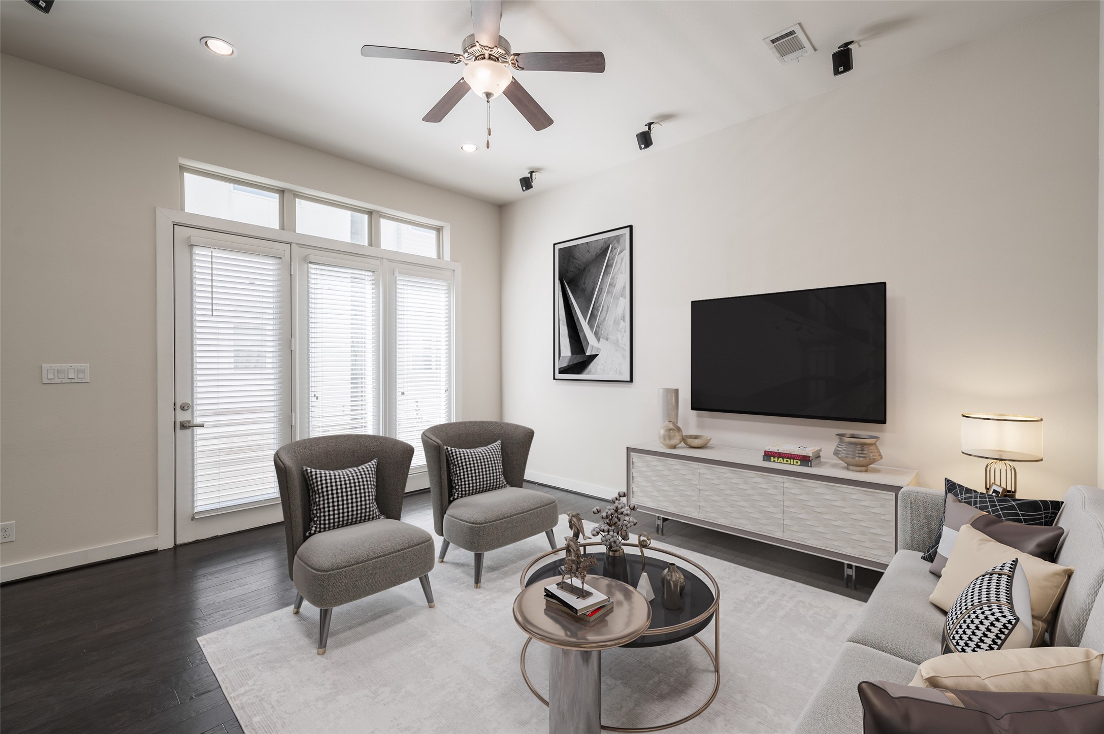 4408 Eli Street, Unit A Houston, TX 77007 - Photo 2 of 22 a living room with furniture a flat screen tv and a large window