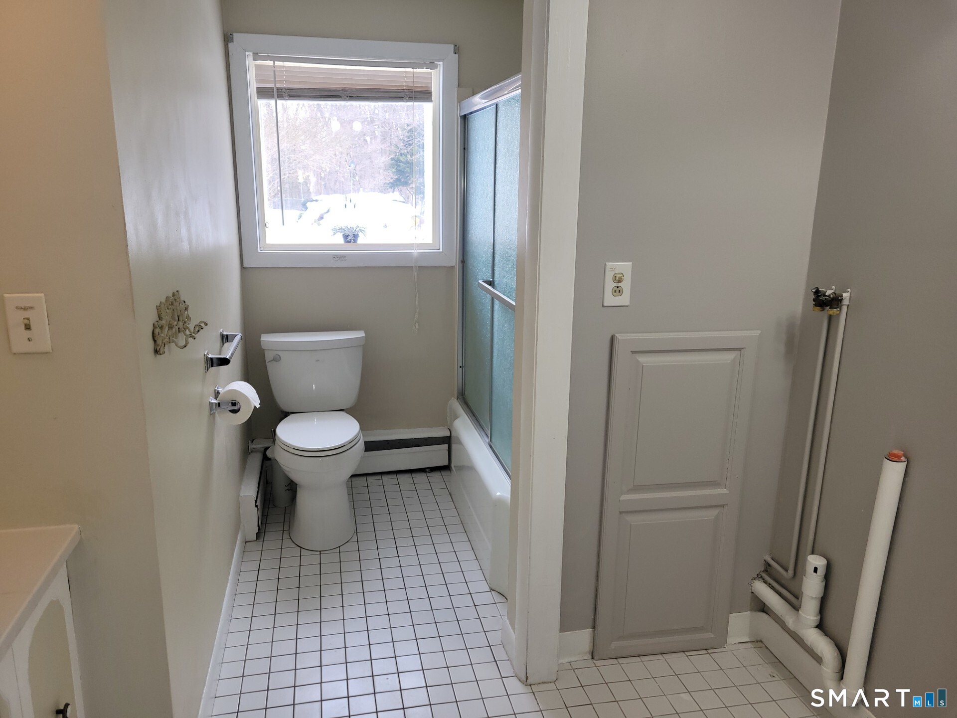 41 East Granby Road Granby, CT 06035 - Photo 13 of 61 a bathroom with a toilet and a window