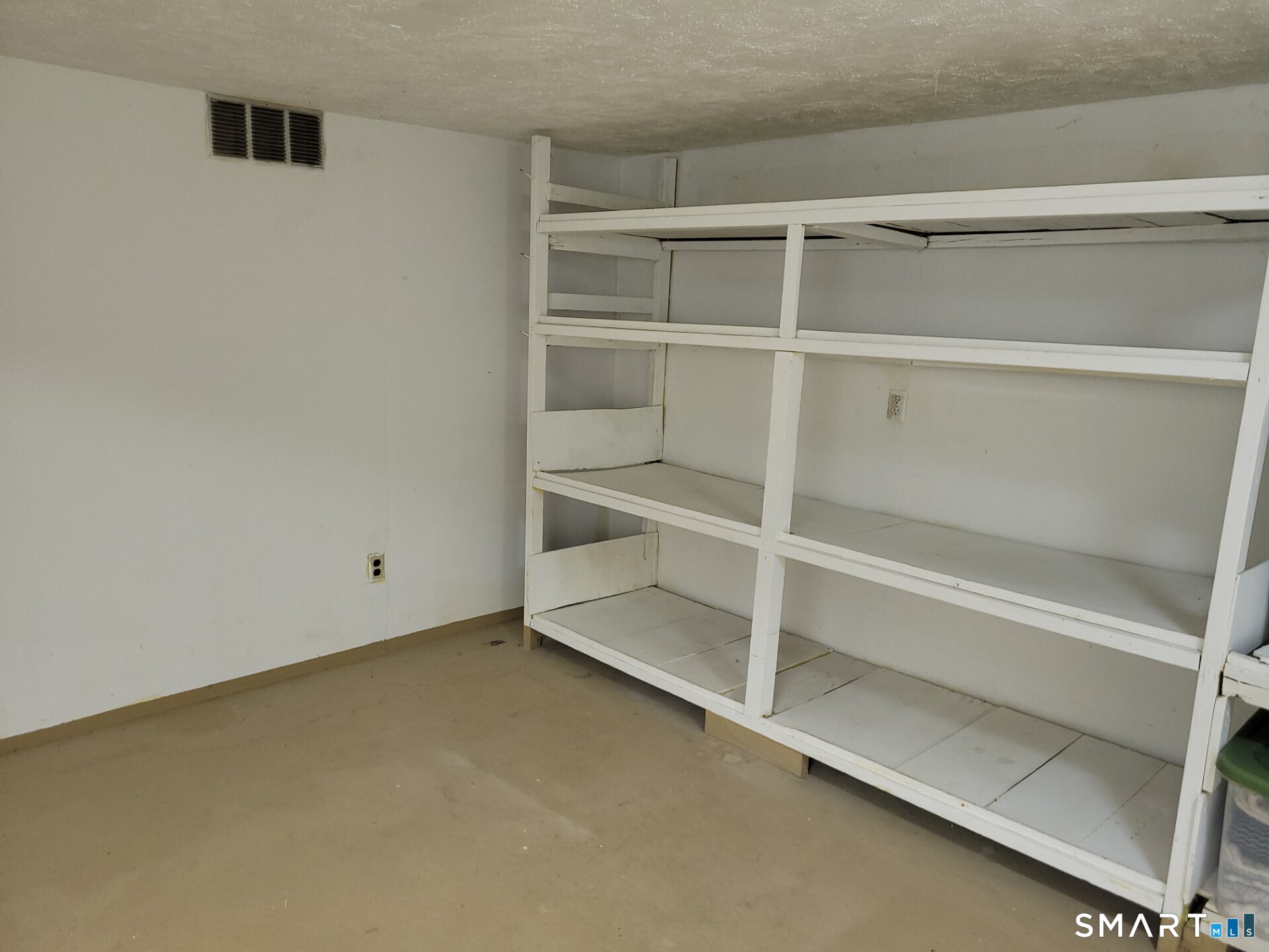 41 East Granby Road Granby, CT 06035 - Photo 15 of 61 a view of an empty room with empty racks