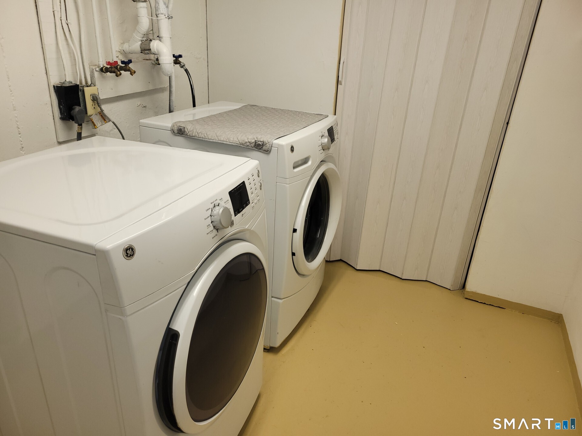 41 East Granby Road Granby, CT 06035 - Photo 16 of 61 a utility room with dryer and washer