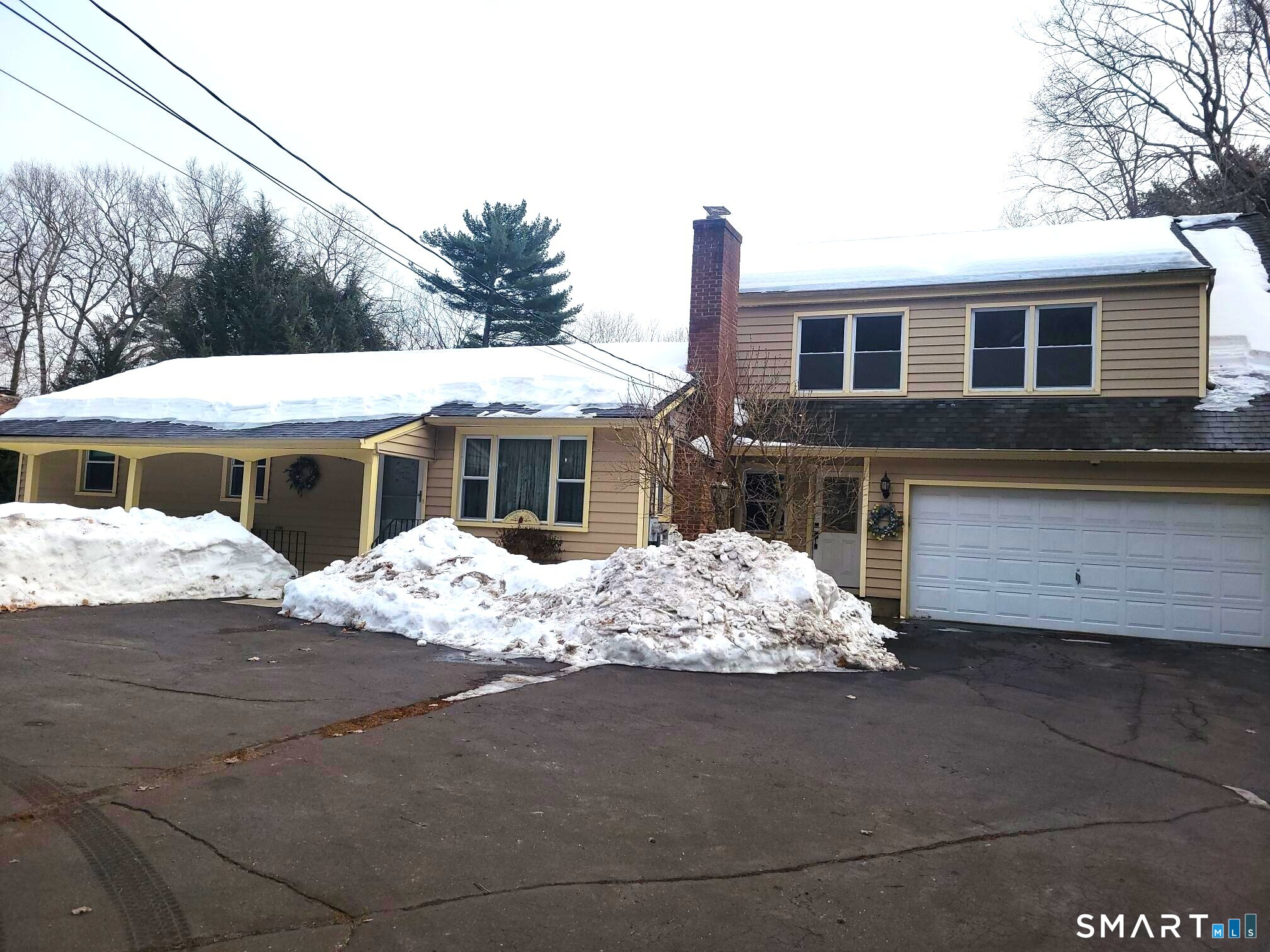 41 East Granby Road Granby, CT 06035 - Photo 20 of 61 a front view of a house with a yard