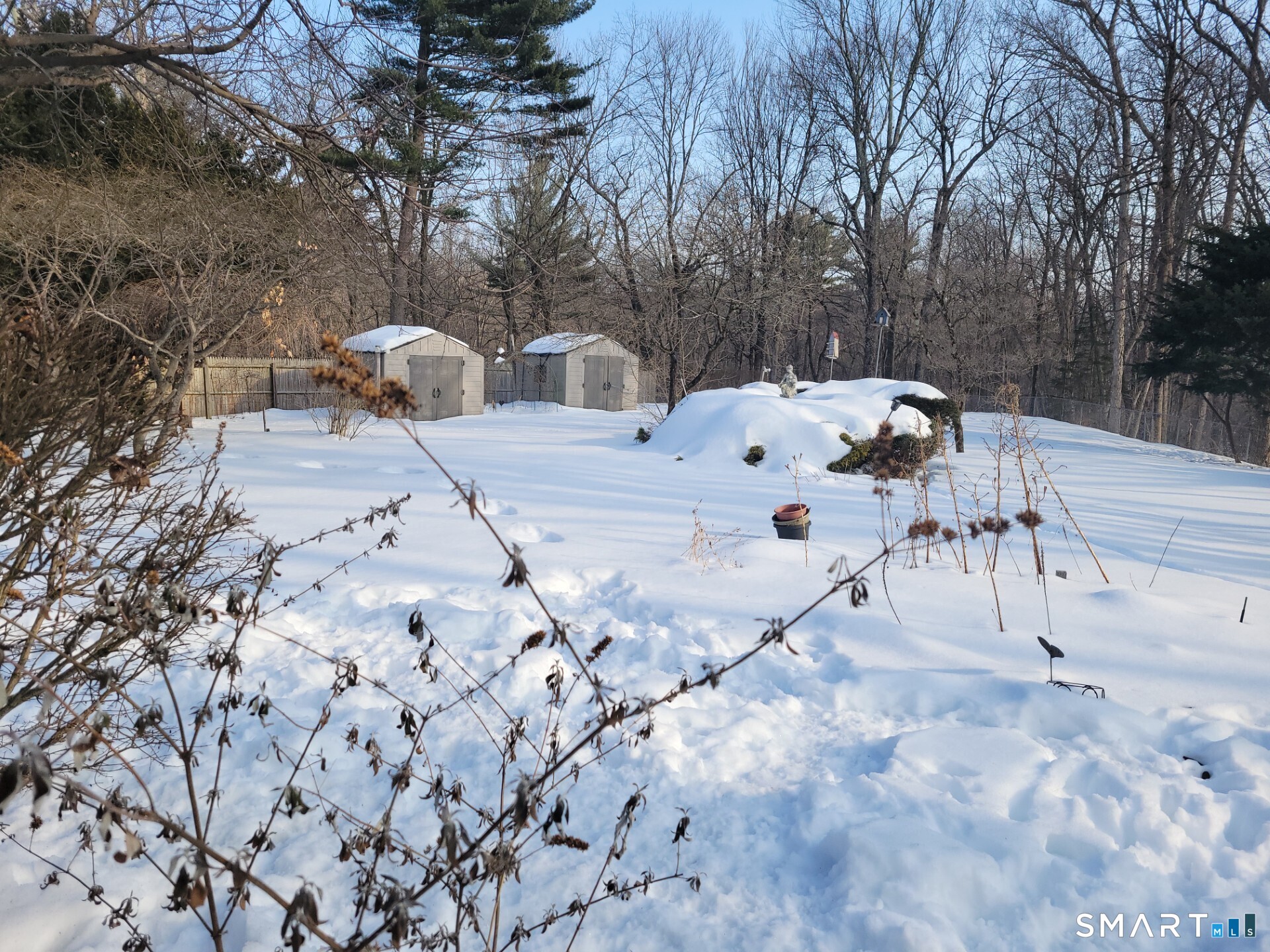 41 East Granby Road Granby, CT 06035 - Photo 2 of 61 a view of backyard with a table and chairs