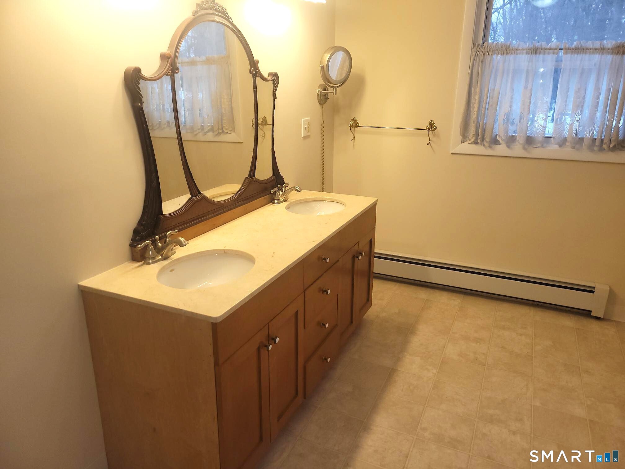 41 East Granby Road Granby, CT 06035 - Photo 31 of 61 a bathroom with a sink vanity and a mirror