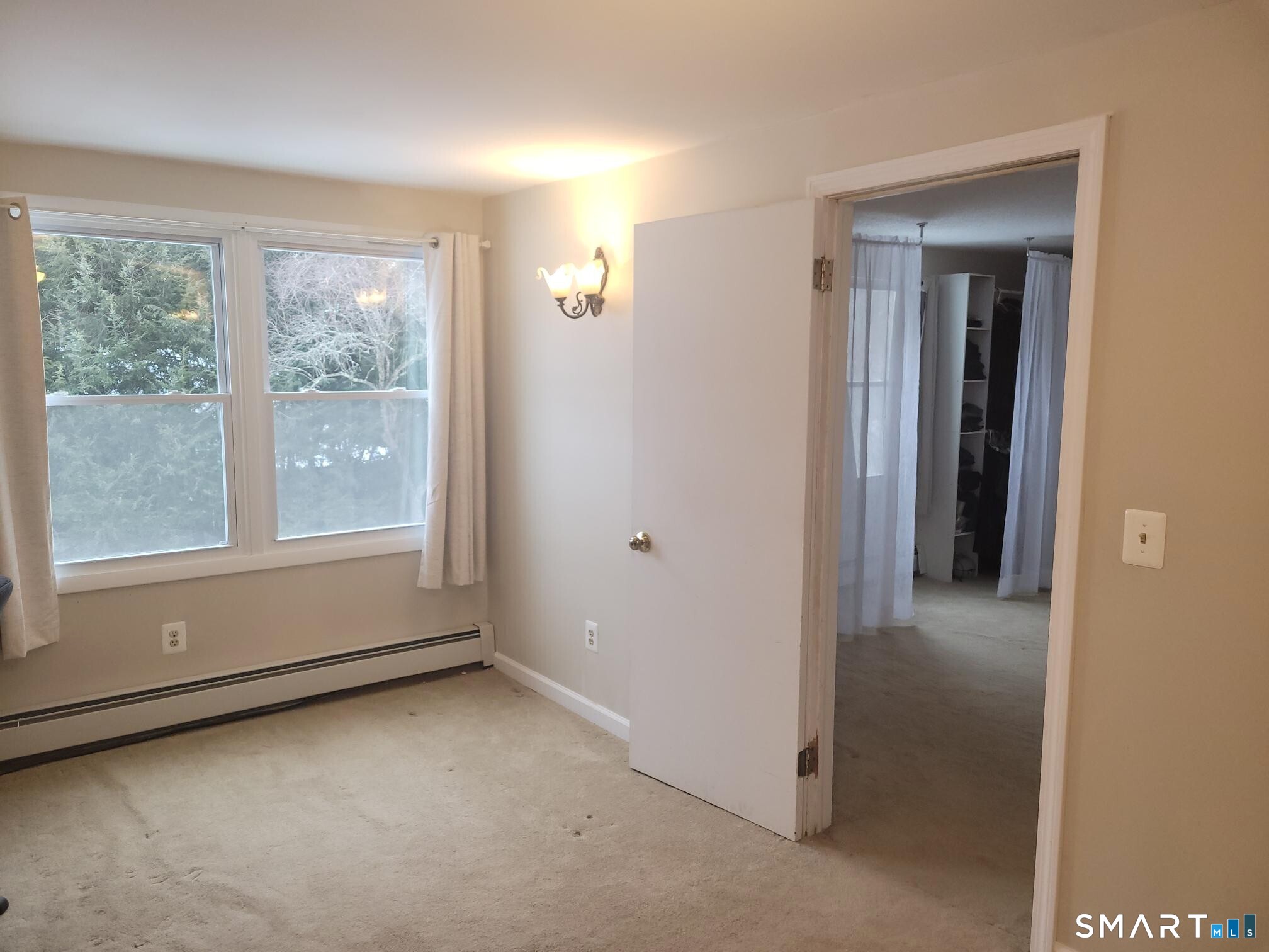 41 East Granby Road Granby, CT 06035 - Photo 34 of 61 a view of an empty room with a window