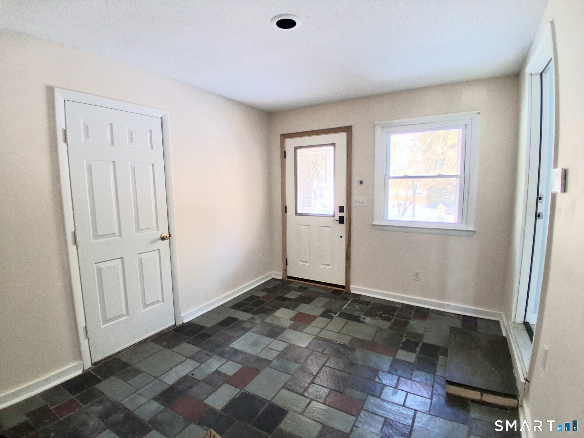 41 East Granby Road Granby, CT 06035 - Photo 52 of 61 a view of an empty room with window and closet area