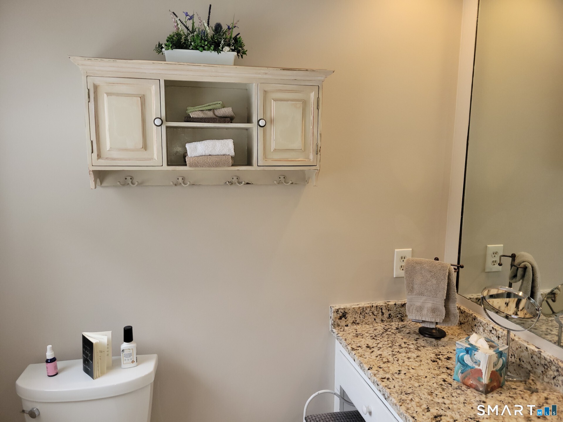41 East Granby Road Granby, CT 06035 - Photo 10 of 61 a bathroom with a sink and a mirror