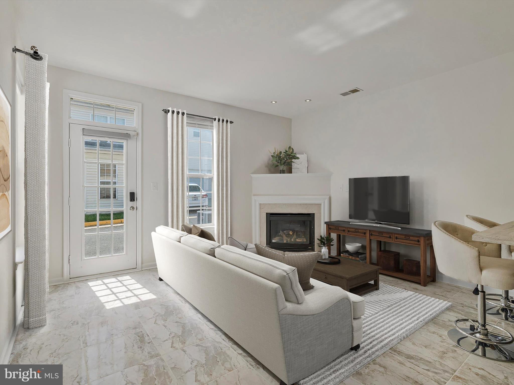 20964 Albion Lane Ashburn, VA 20147 - Photo 10 of 34 Virtually staged FamRoom off Kitchen