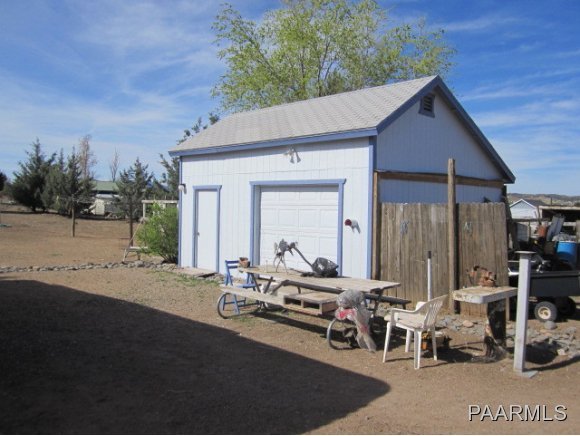 2620 North Reed Road Chino Valley, AZ 86323 - Photo 18 of 23 a backyard of a house with outdoor seating