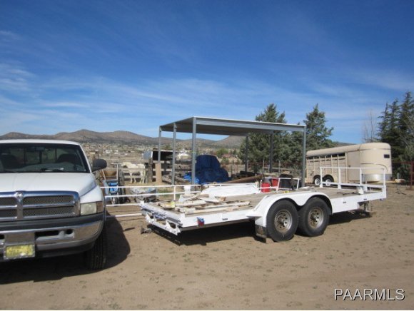 2620 North Reed Road Chino Valley, AZ 86323 - Photo 20 of 23 a view of a car parked in garage