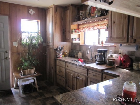 2620 North Reed Road Chino Valley, AZ 86323 - Photo 4 of 23 a kitchen with a sink and cabinets