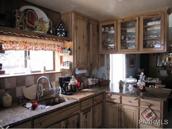 2620 North Reed Road Chino Valley, AZ 86323 - Photo 5 of 23 a kitchen with lots of counter top space and a window
