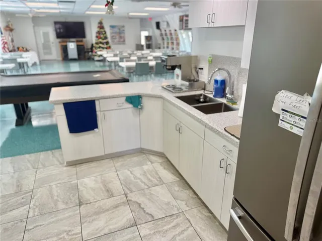 a kitchen with a stove and a microwave