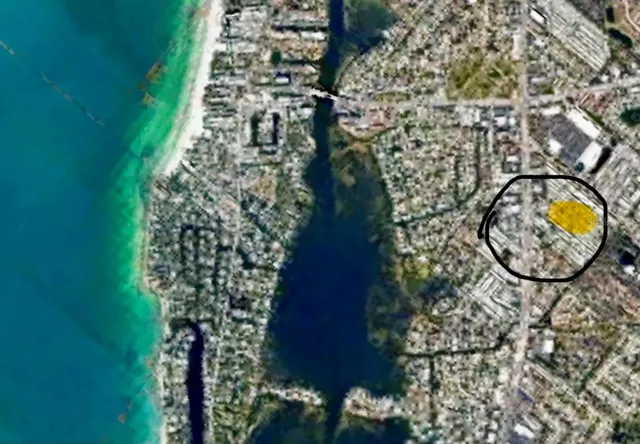 a view of a swimming pool with an outdoor space