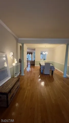 a room with furniture and a wooden floor