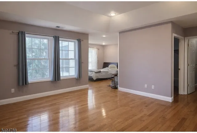 a view of livingroom with furniture and workspace