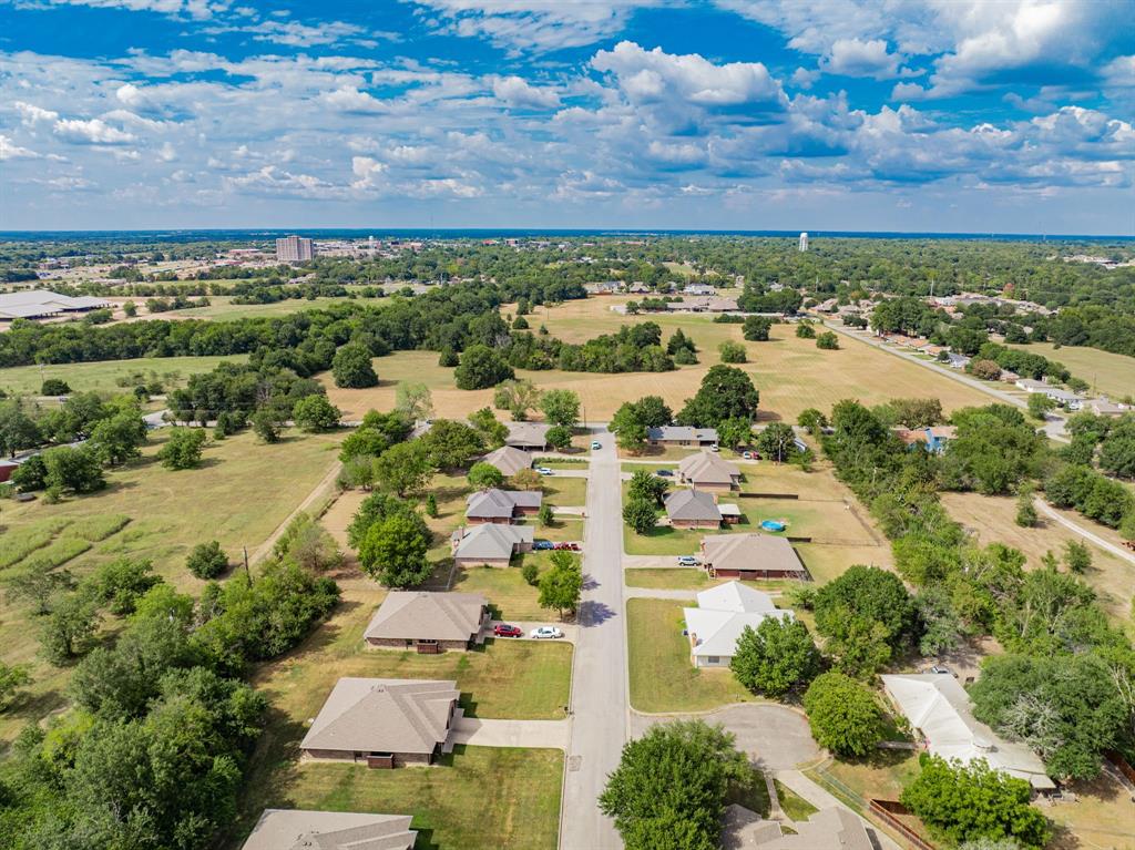 26 Duplex Portfolio Commerce, TX 75428 - Photo 2 of 39 an aerial view of residential building with parking space