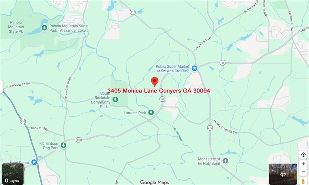 3405 Monica Lane Southwest Conyers, GA 30094 - Photo 12 of 26 a white bath tub sitting next to a white wall