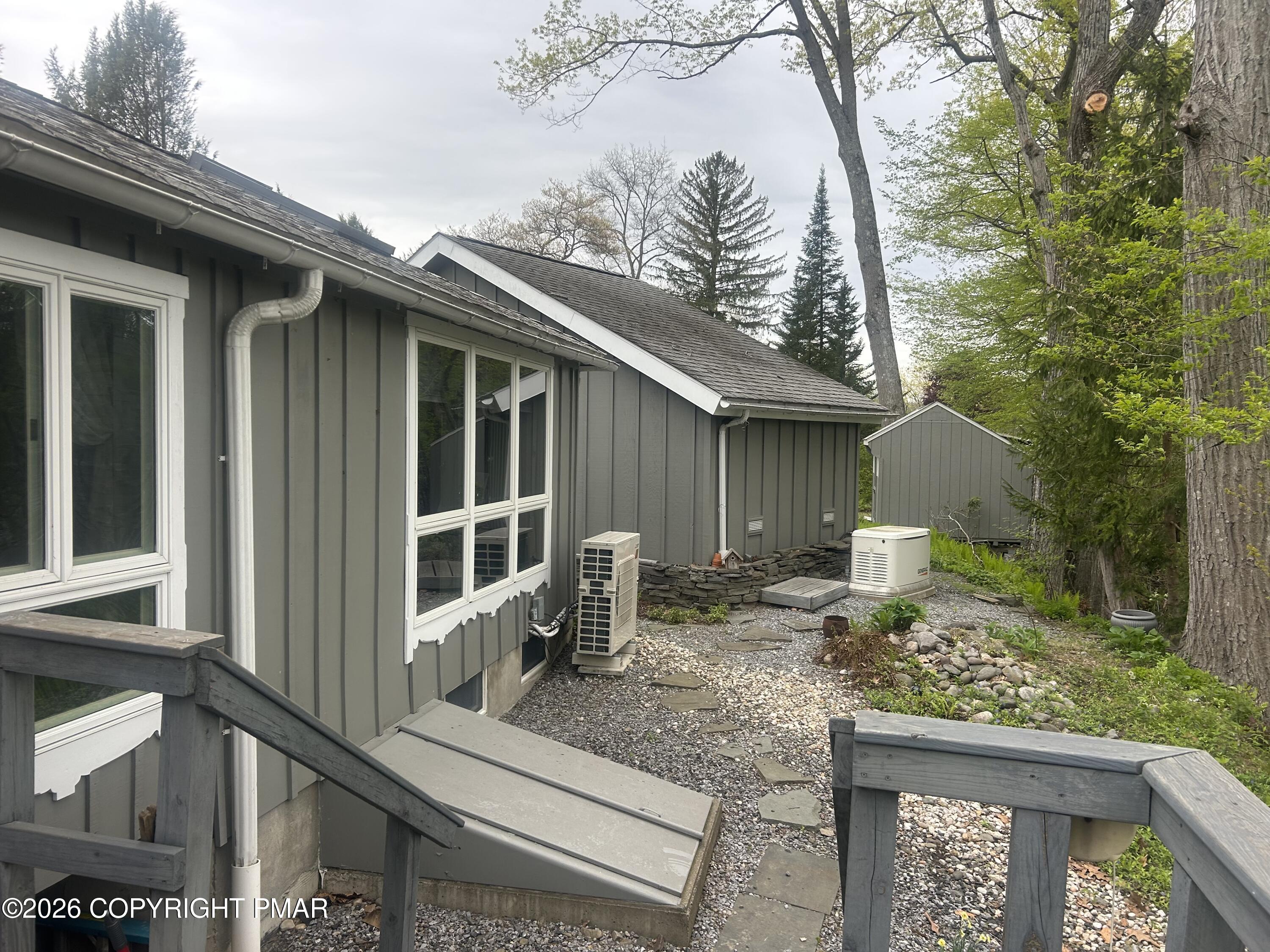 4379 River Road Mount Bethel, PA 18343 - Photo 8 of 48 a house view with a outdoor space