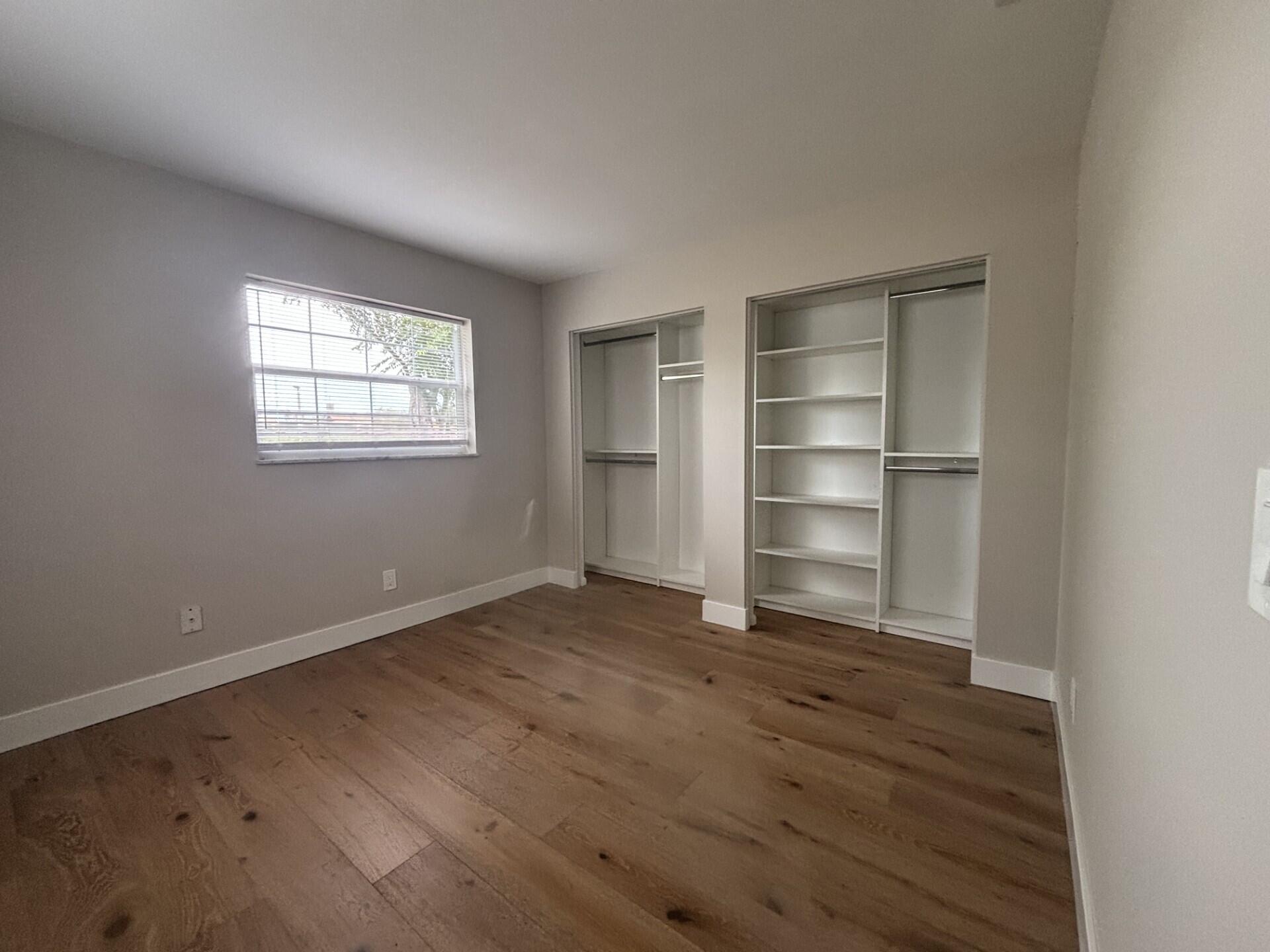 1160 East 12th Street Stuart, FL 34996 - Photo 12 of 25 a view of an empty room with a closet