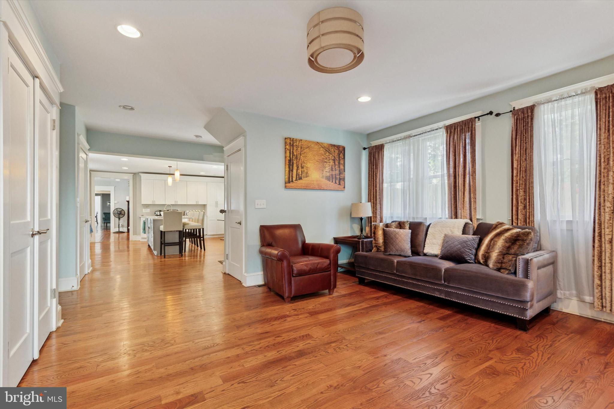 140 North Rolling Road Springfield, PA 19064 - Photo 6 of 34 a living room with furniture wooden floor and a large window