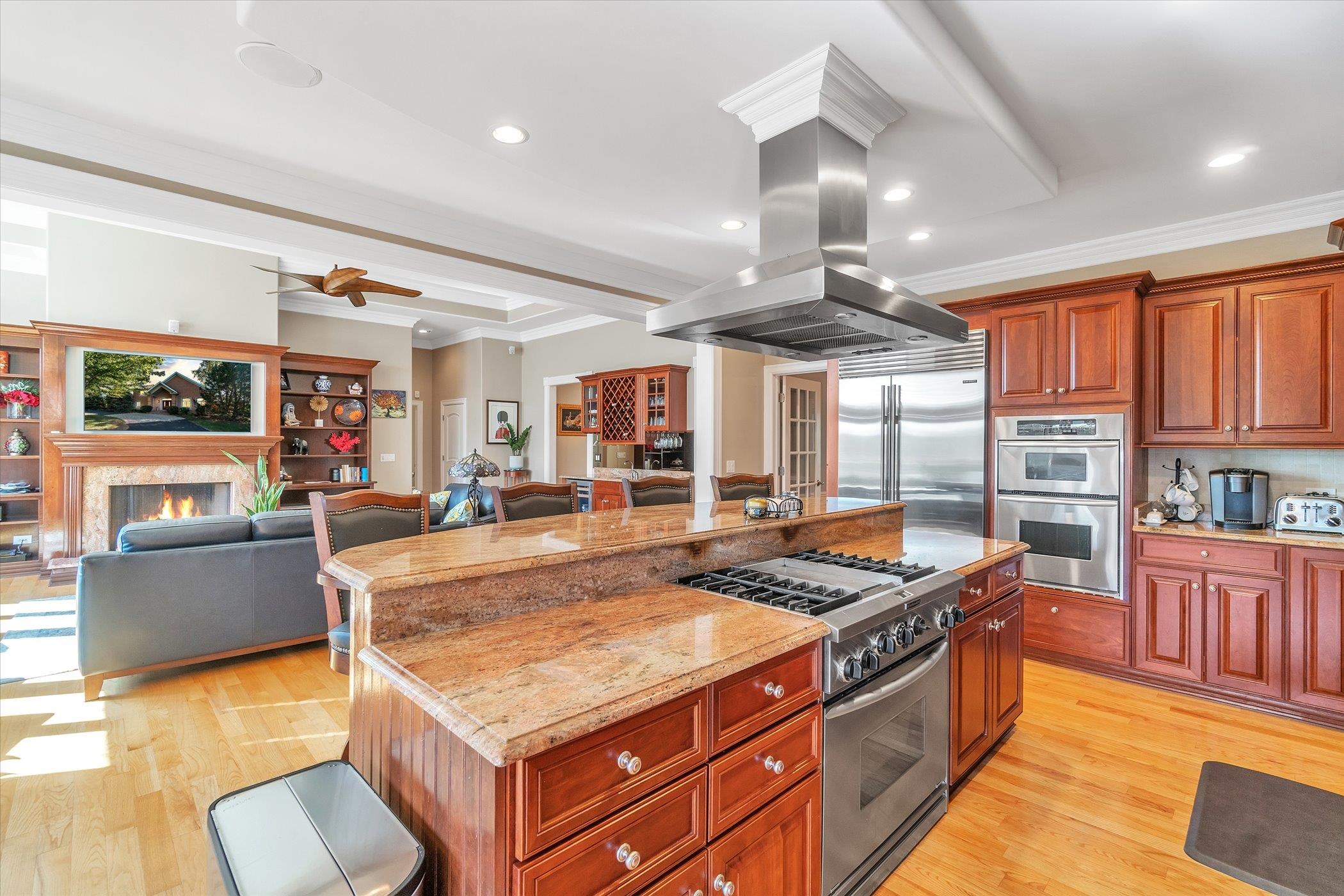 12535 Bellingham Road Caledonia, IL 61011 - Photo 14 of 57 a kitchen with stainless steel appliances granite countertop a stove and a refrigerator