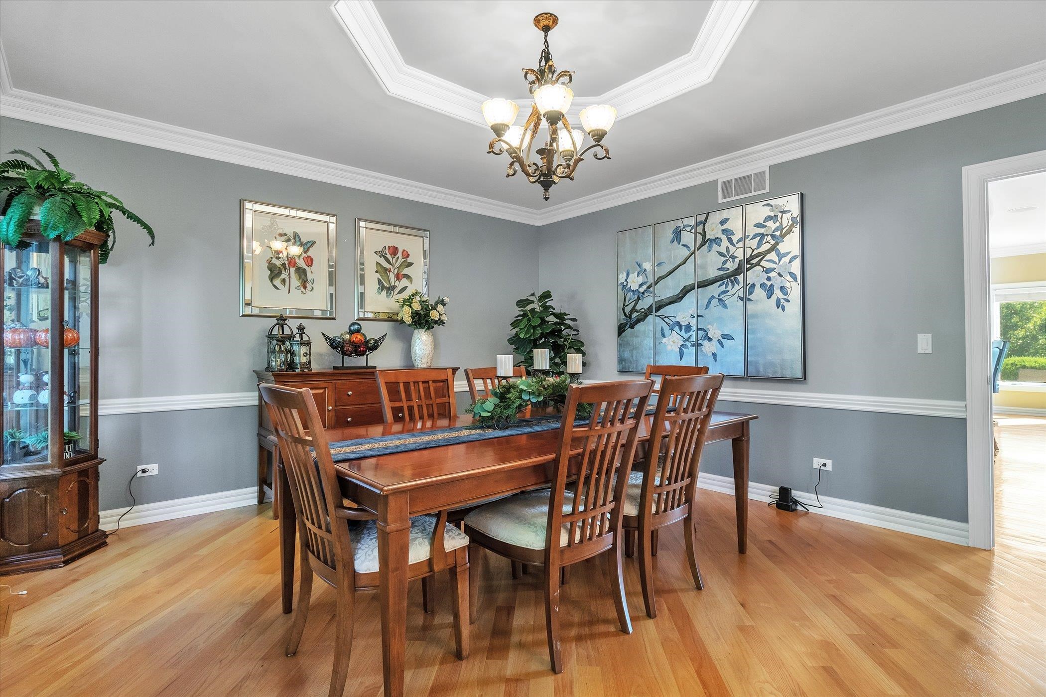 12535 Bellingham Road Caledonia, IL 61011 - Photo 16 of 57 a view of a dining room with furniture window and wooden floor