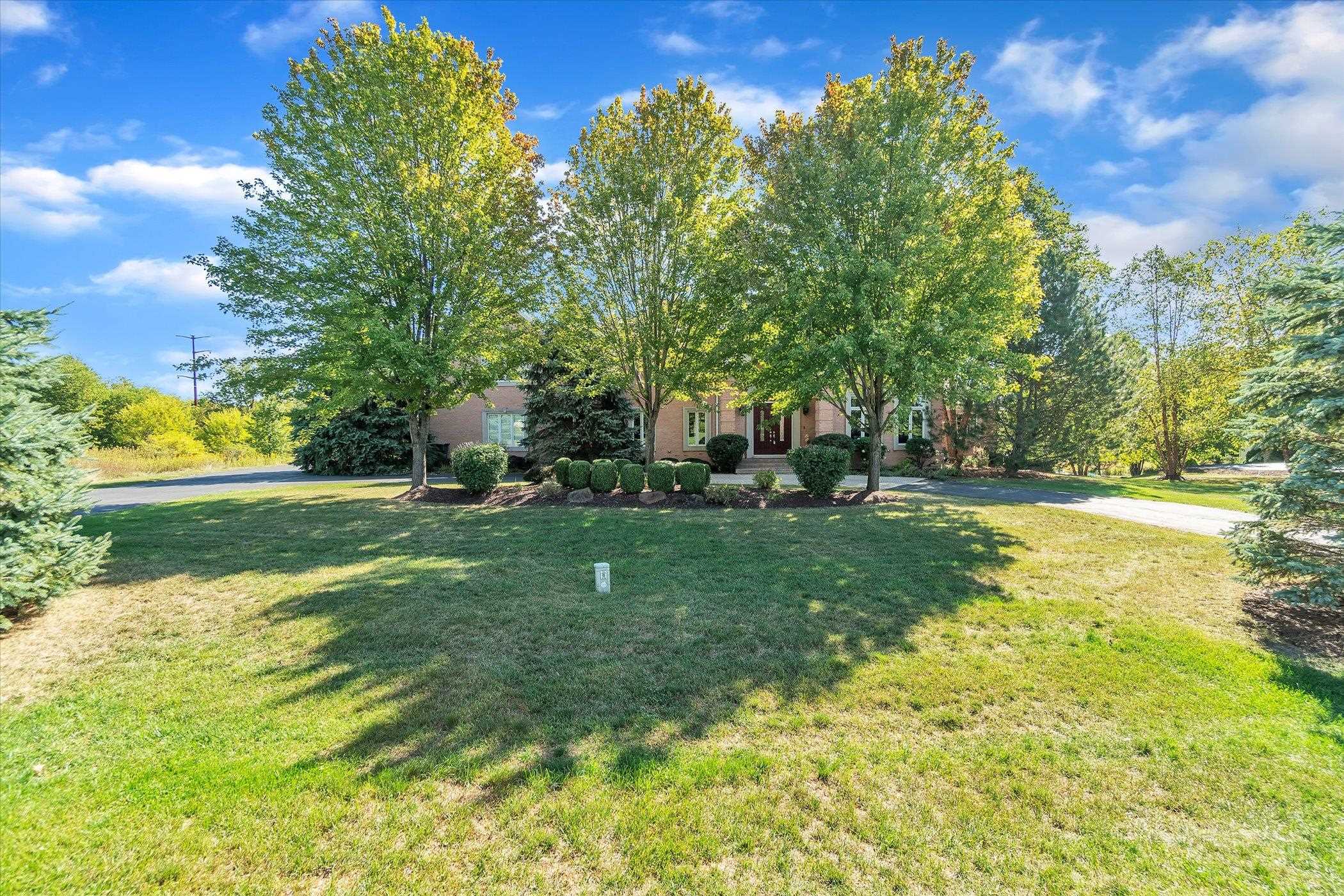 12535 Bellingham Road Caledonia, IL 61011 - Photo 2 of 57 a garden view