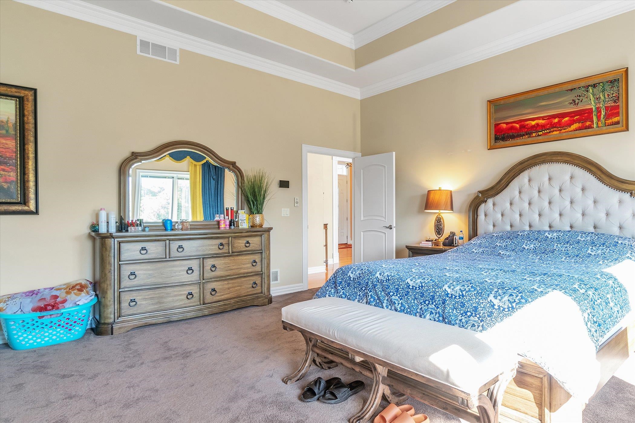 12535 Bellingham Road Caledonia, IL 61011 - Photo 23 of 57 a bedroom with a bed and a dresser in it