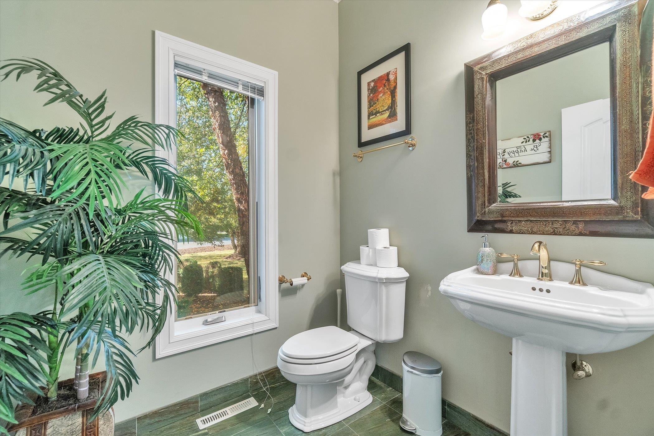12535 Bellingham Road Caledonia, IL 61011 - Photo 31 of 57 a bathroom with a sink and a toilet