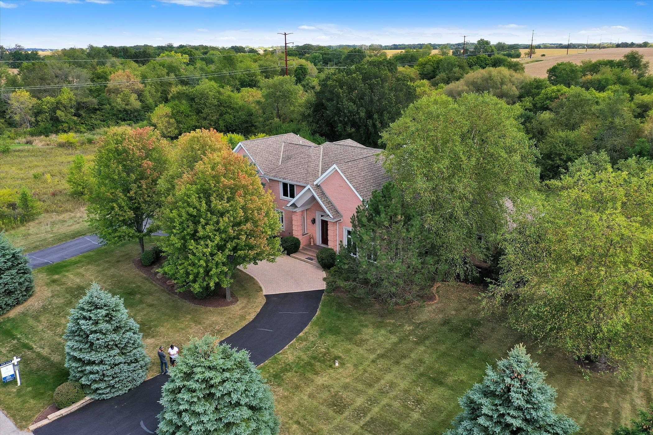 12535 Bellingham Road Caledonia, IL 61011 - Photo 52 of 57 an aerial view of a house with yard