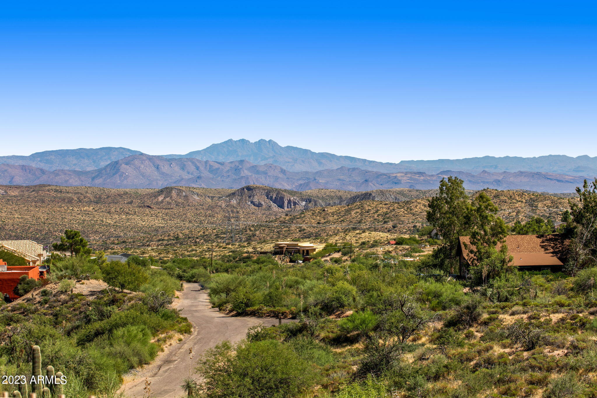 11519 East Blue Wash Road Scottsdale, AZ 85262 - Photo 16 of 42 a view of a lush green hillside and houses