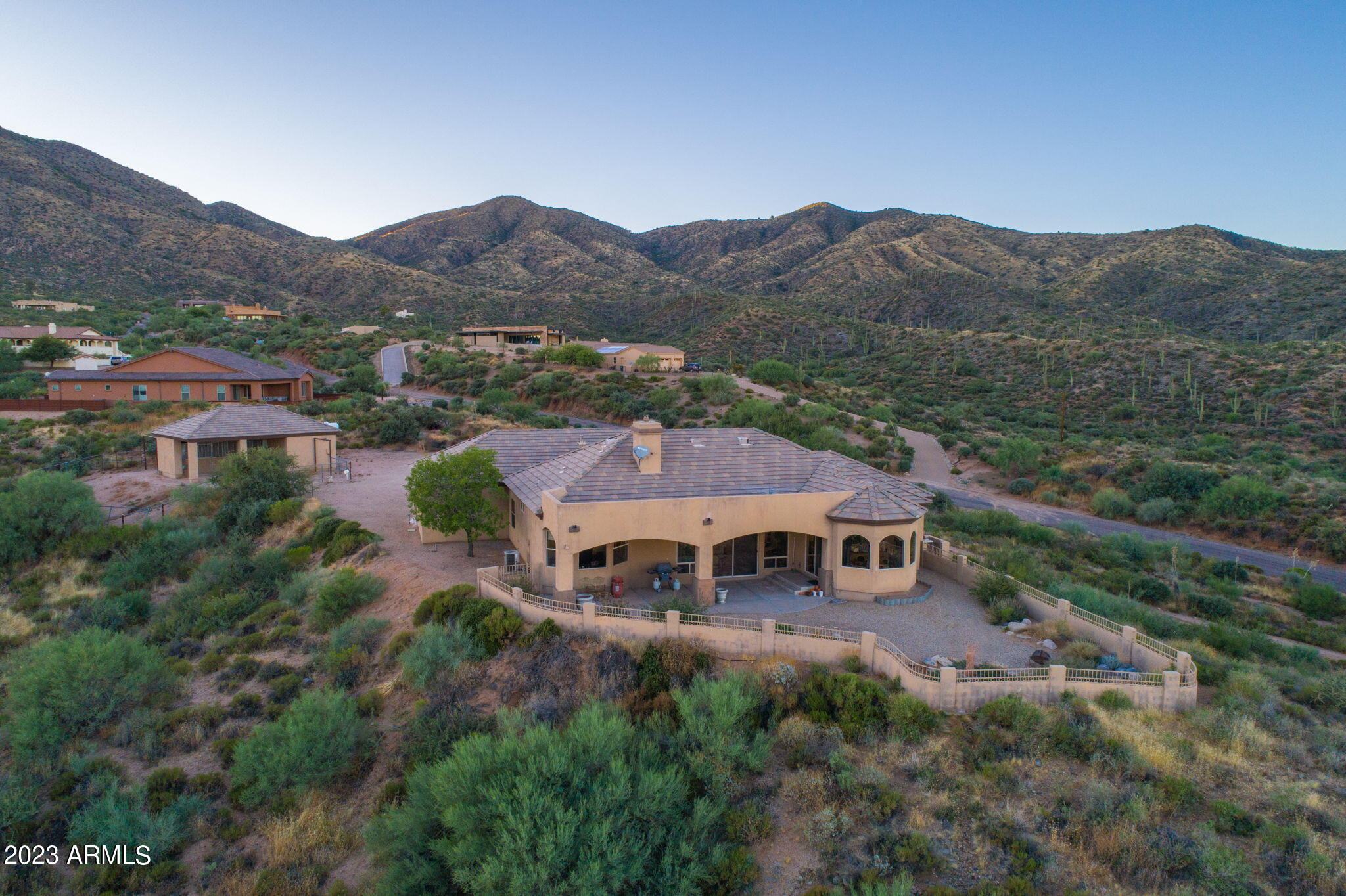 11519 East Blue Wash Road Scottsdale, AZ 85262 - Photo 19 of 42 a view of a house with a mountain and a forest