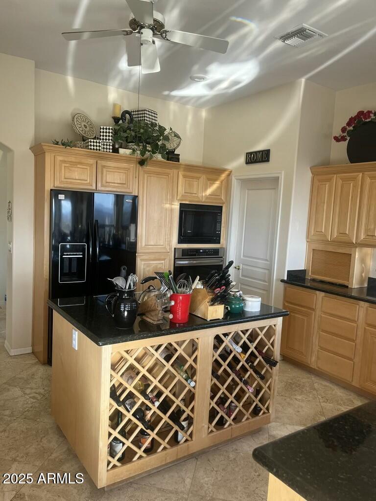 11519 East Blue Wash Road Scottsdale, AZ 85262 - Photo 26 of 42 a kitchen with stainless steel appliances kitchen island granite countertop a sink and cabinets