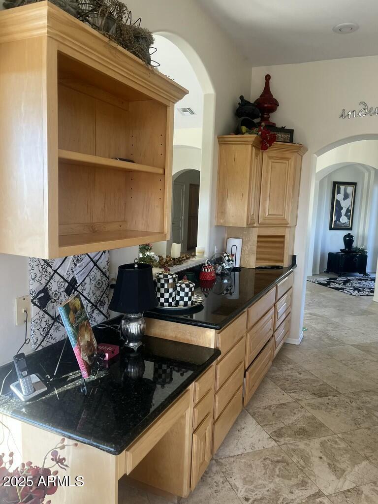 11519 East Blue Wash Road Scottsdale, AZ 85262 - Photo 28 of 42 a kitchen with stove and cabinets