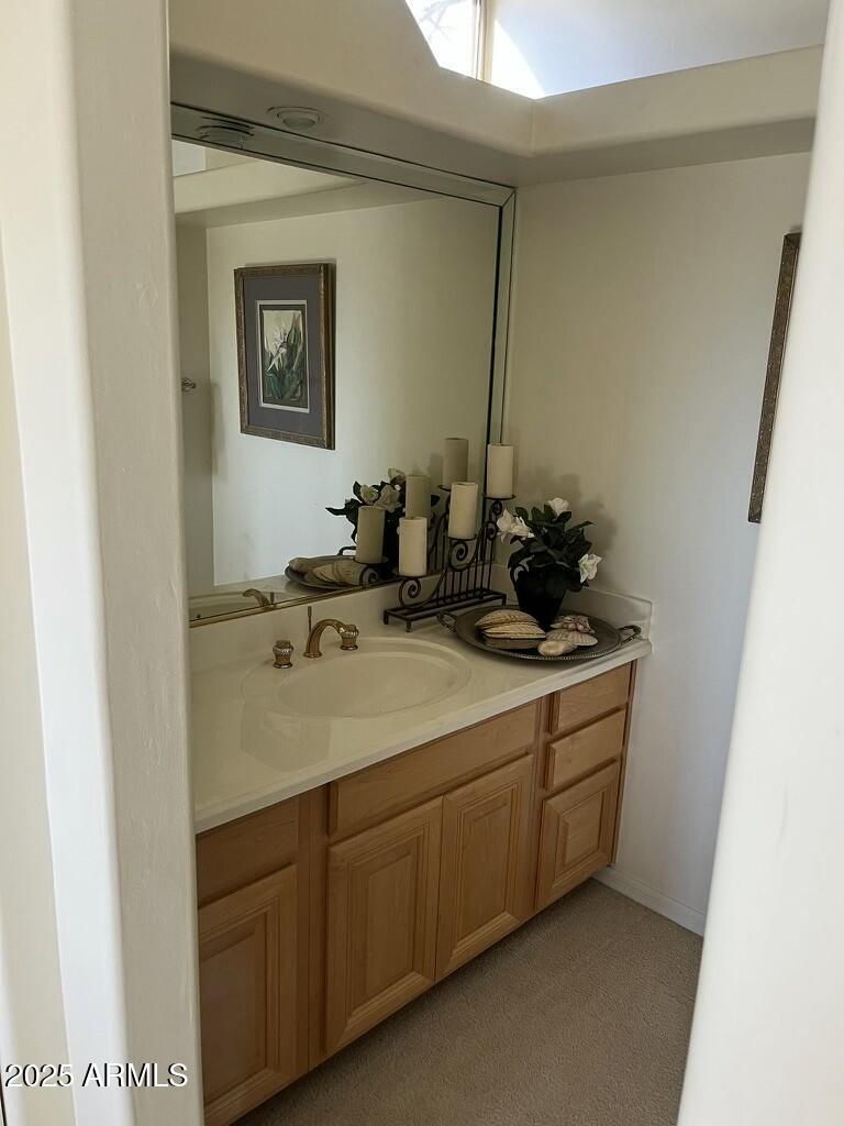 11519 East Blue Wash Road Scottsdale, AZ 85262 - Photo 35 of 42 a bathroom with a sink and a mirror