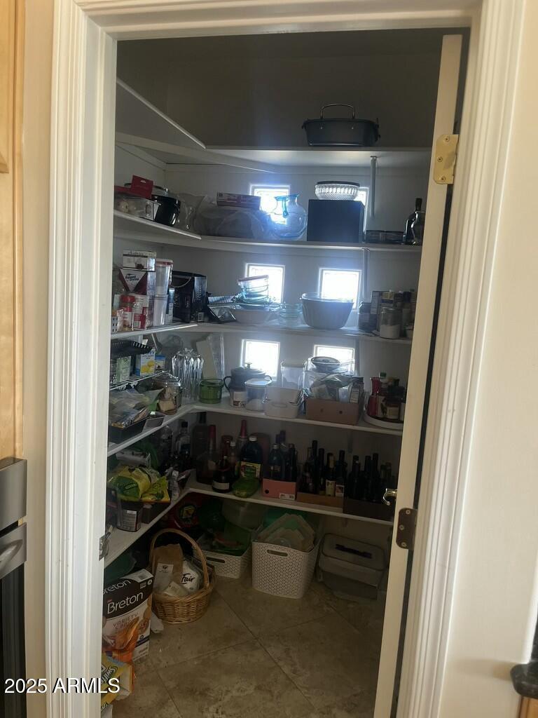 11519 East Blue Wash Road Scottsdale, AZ 85262 - Photo 41 of 42 a room with lot of shelves