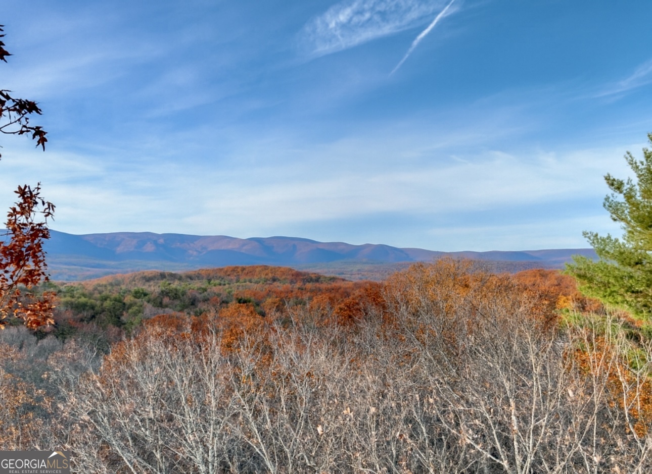 a view of mountain view with mountains in the background