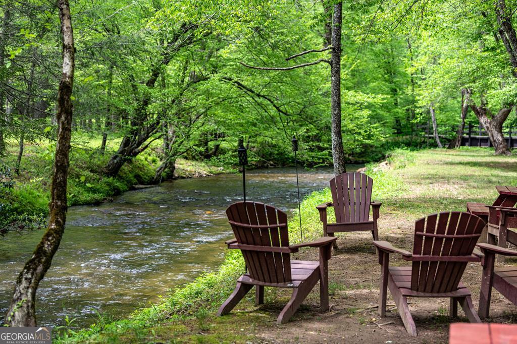 0 Creek Camp Road Ellijay, GA 30536 - Photo 19 of 40 a view of a chairs and table in the patio