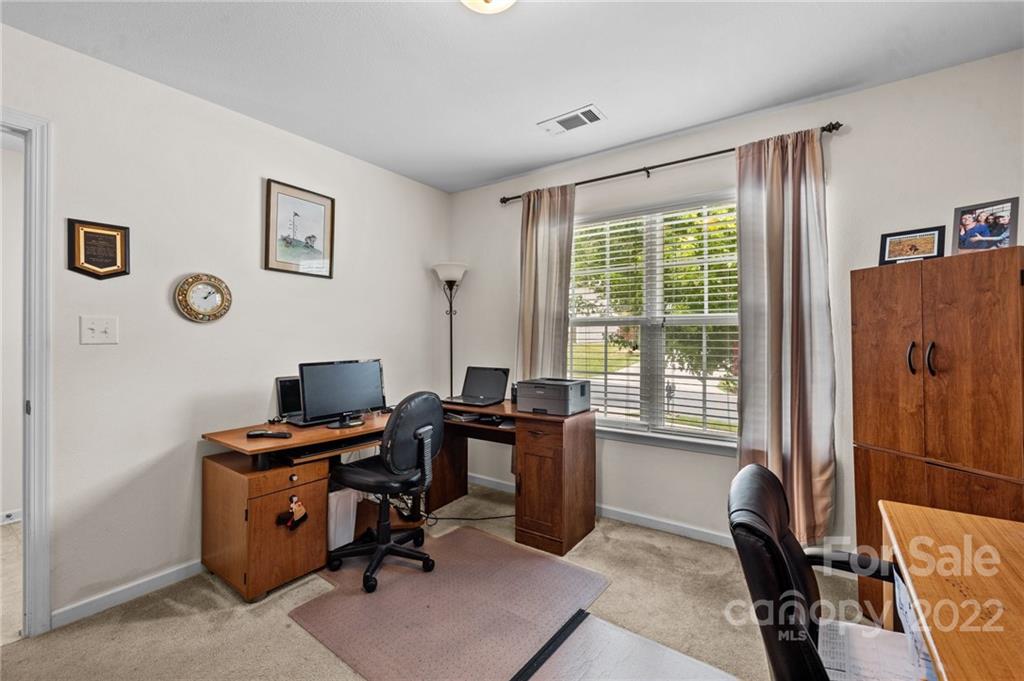 3005 Arthur Road, Unit 170 Indian Land, SC 29707 - Photo 18 of 38 a view of a workspace with furniture and a window