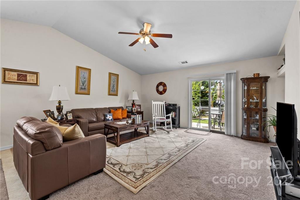 3005 Arthur Road, Unit 170 Indian Land, SC 29707 - Photo 26 of 38 a living room with furniture and a flat screen tv