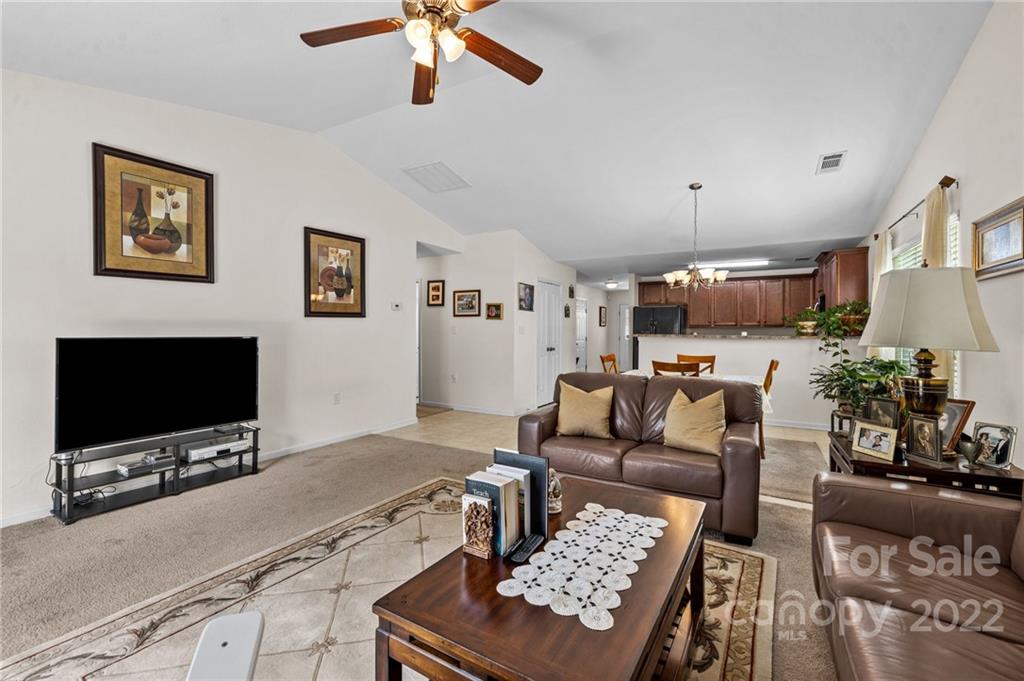 3005 Arthur Road, Unit 170 Indian Land, SC 29707 - Photo 28 of 38 a living room with furniture and a flat screen tv