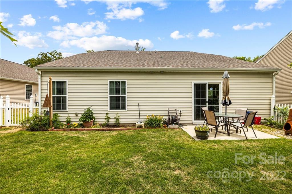 3005 Arthur Road, Unit 170 Indian Land, SC 29707 - Photo 3 of 38 a front view of house with yard and seating