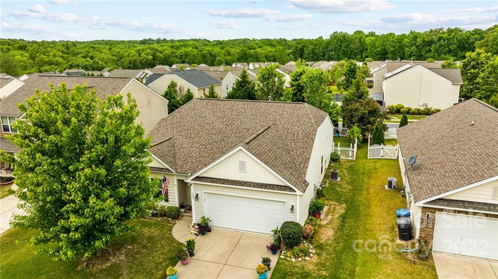 3005 Arthur Road, Unit 170 Indian Land, SC 29707 - Photo 6 of 38 an aerial view of a house with a yard and lake view