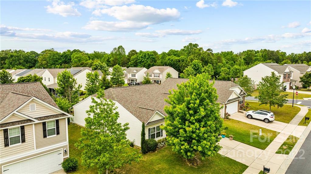 3005 Arthur Road, Unit 170 Indian Land, SC 29707 - Photo 10 of 38 a aerial view of a house with a yard and potted plants
